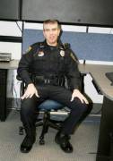 Hot Cop Sitting With His Legs Spread (Would Love To Get Between Them)