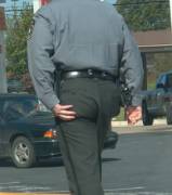 Real Cop Scratching His Ass