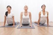 3 Clothed Ladies Doing Yoga