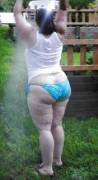 Hosing Off In The Yard 