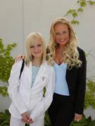 Worn Woman And Her Daughter