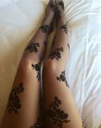 Black Floral Pantyhose On Long Legs.