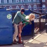 Behind The Recycling Dumpster.