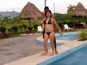 Chubby Latina Girl Having Fun And Dancing In A Pool Party